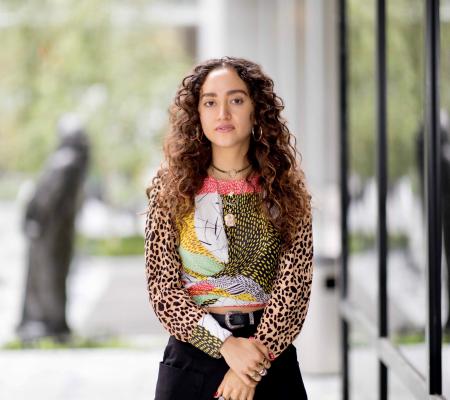 portrait of graduate Angelique Rosales Salgado who now works as a curatorial fellow for MoMA and the Studio Museum in Harlem