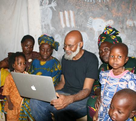 Moyo Okediji working with students and community