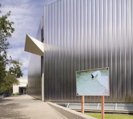 image of museum lawn with outdoor photography in the right of center