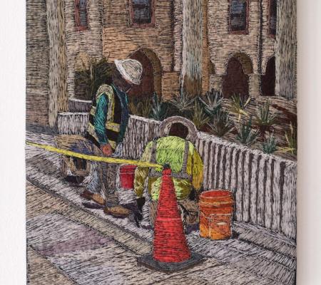 embroidered artwork that portrays utility workers at a manhole in street