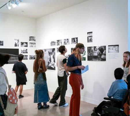 people in gallery during art opening