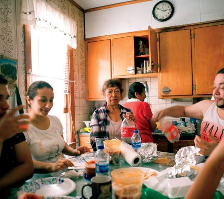 image of a family eating at a table