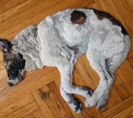 image of a rug shaped like a dog