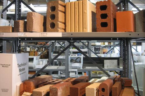 shelf holding various material samples